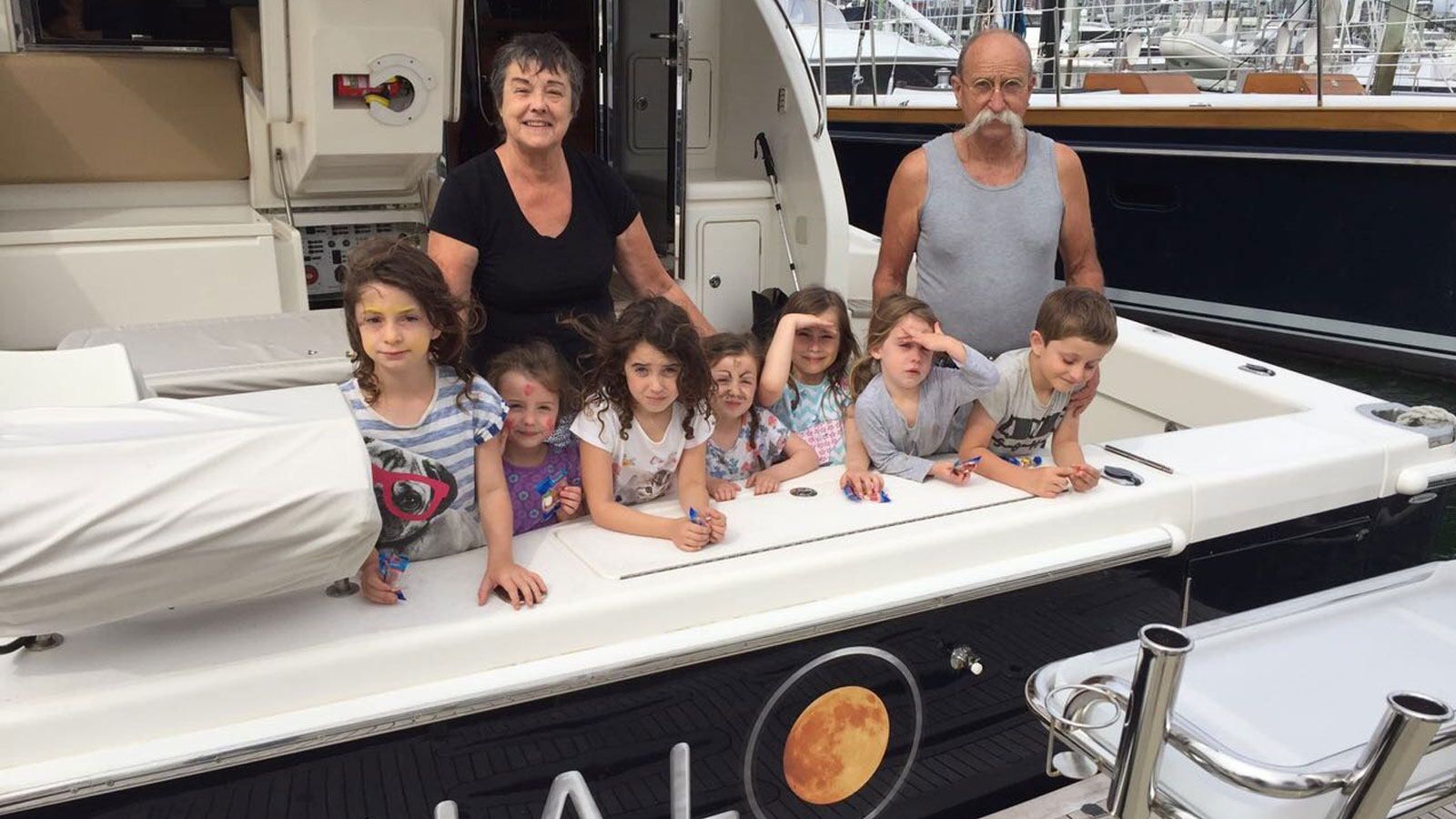 Boat owner Bill Allen with family on motor yacht Halo